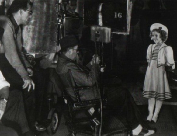 Director John Ford and Shirley Temple from 'The Shirley Temple Archive'